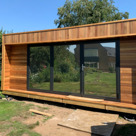 Outbuilding with glass doors