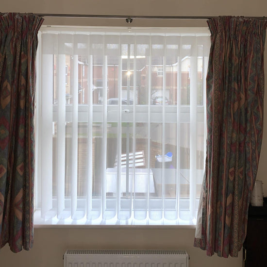 Window with blinds and curtains