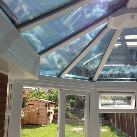 Window film fitting on glass ceiling