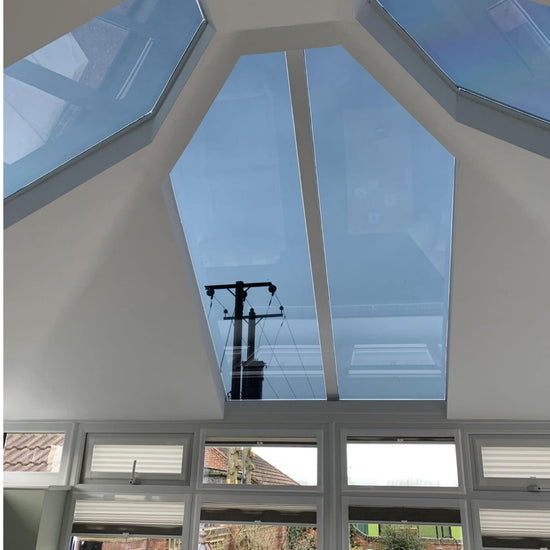 Room with glass roof panels
