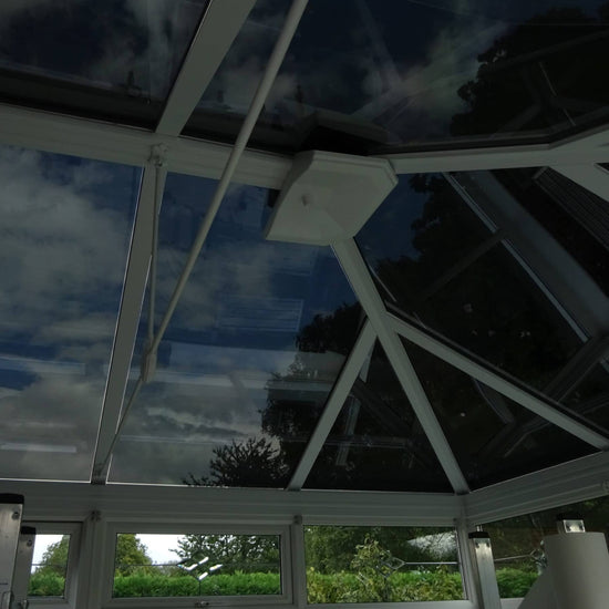 Glass roof fitted with window film