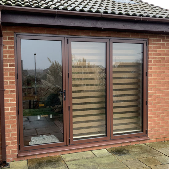 Patio door and windows fitted with blinds