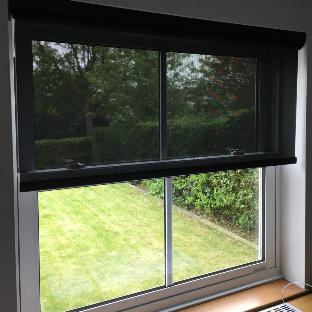 Solar blind fitted in window